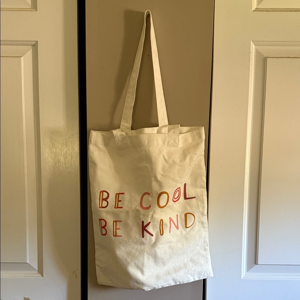 Source Unknown Cream Tote Bag with Red and Orange Text